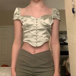 Sage buttoned and runched silky top